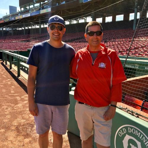 Two RBRL board members pose in the dugout at JetBlue Park during a Red Sox spring training visit.