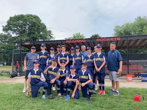 The Reading Padres pose for a team photo in front of the Reading Rockets dugout after sweeping the Angels for the franchise's first RBRL championship.
